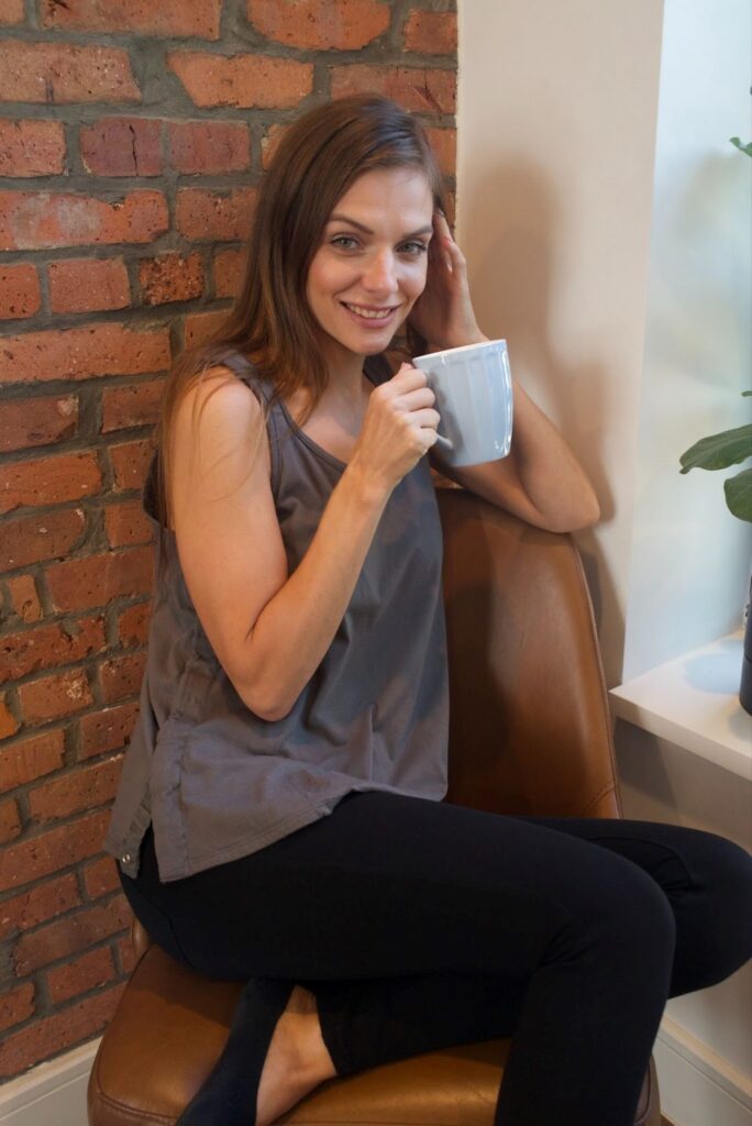 a girl with cup